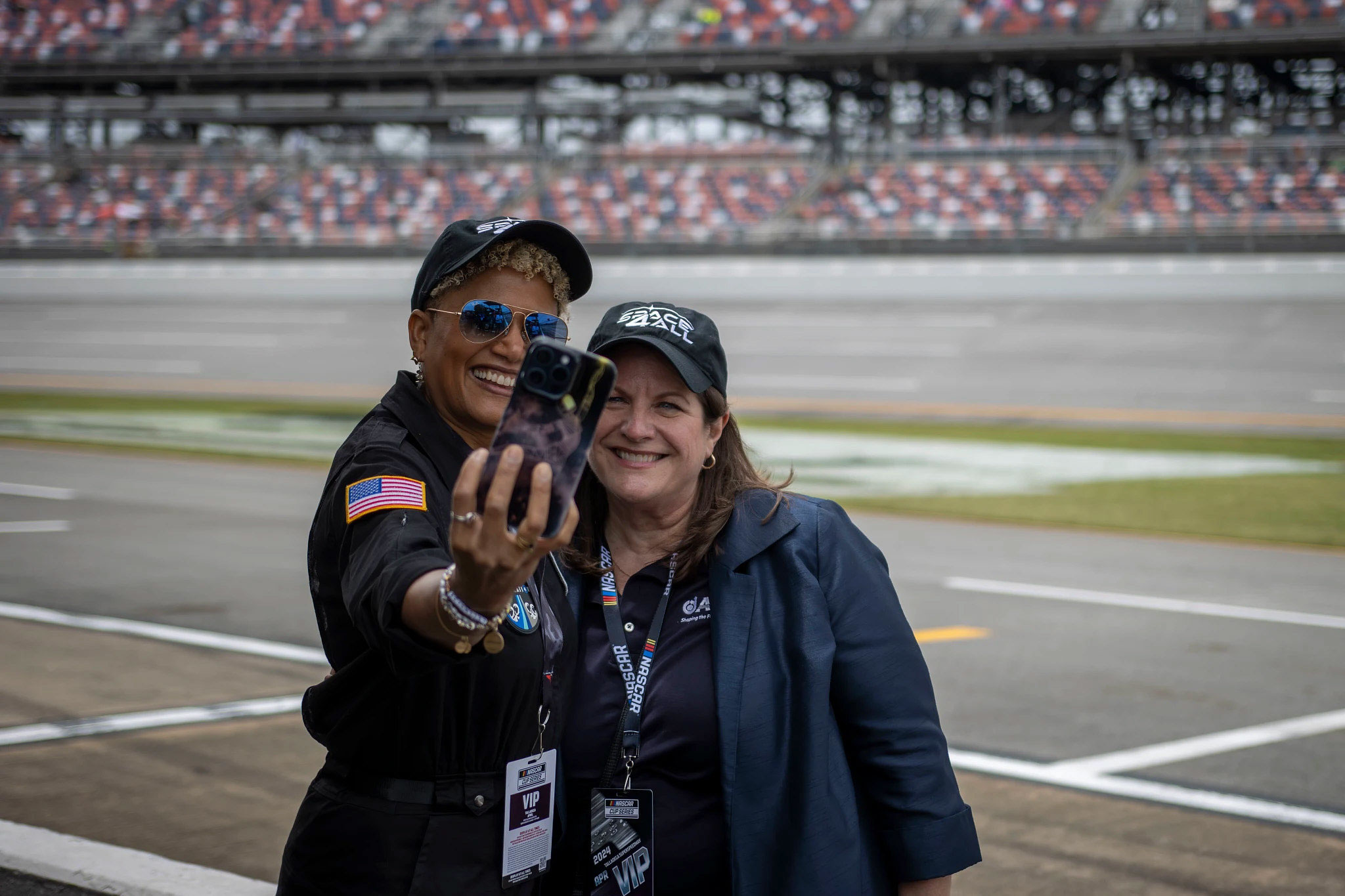 AIAA Director of Communications Rebecca Gray (right) pictured with Dr. Sian Proctor at Talladega Super Speedway during Space4All, Sunday, April 21, 2024