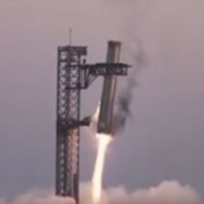 SpaceX Starship Booster Caught by Launch Gantry During Landing